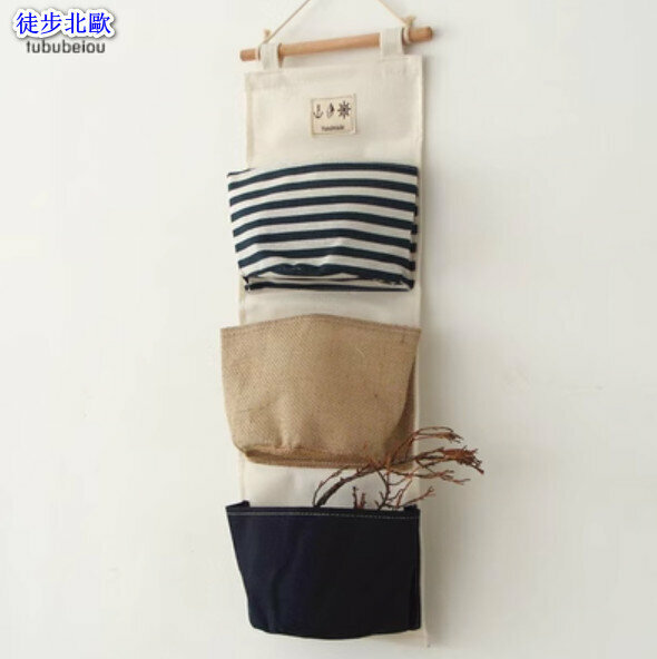 Hot selling wall-mounted cotton and linen fabric storage bag [blue spliced ​​three pockets] [specification: 58*20cm]