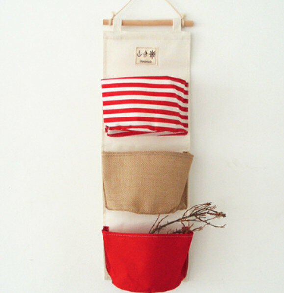 Hot selling wall-mounted cotton and linen fabric storage bag [red spliced ​​three pockets] [Specification: 58*20cm]