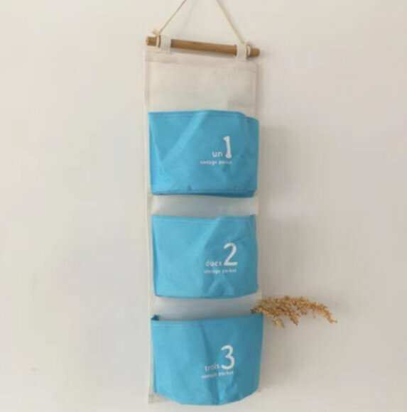 Hot selling wall-mounted cotton and linen fabric storage hanging bag [sky blue number three pockets] [specification: 58*20cm]