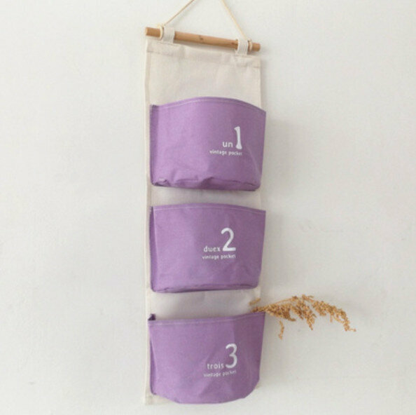 Hot selling wall-mounted cotton and linen fabric storage bag [Romantic Purple Number Three Pockets] [Specification: 58*20cm]