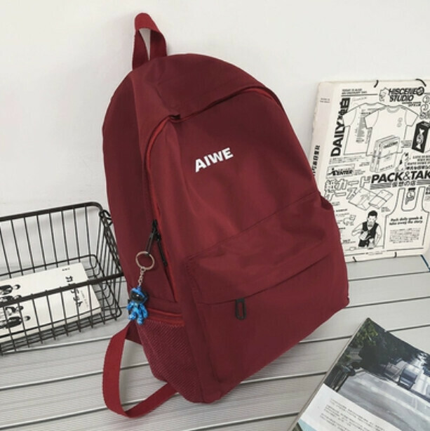 Popular trendy brand backpack for men (red with astronaut pendant)