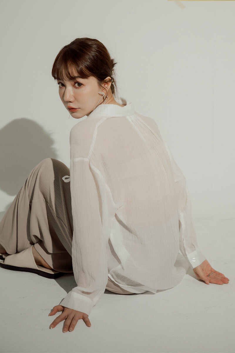 慵懶排釦坑條寬褲