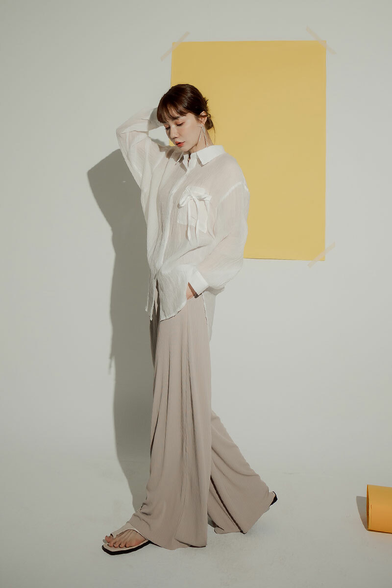 慵懶排釦坑條寬褲