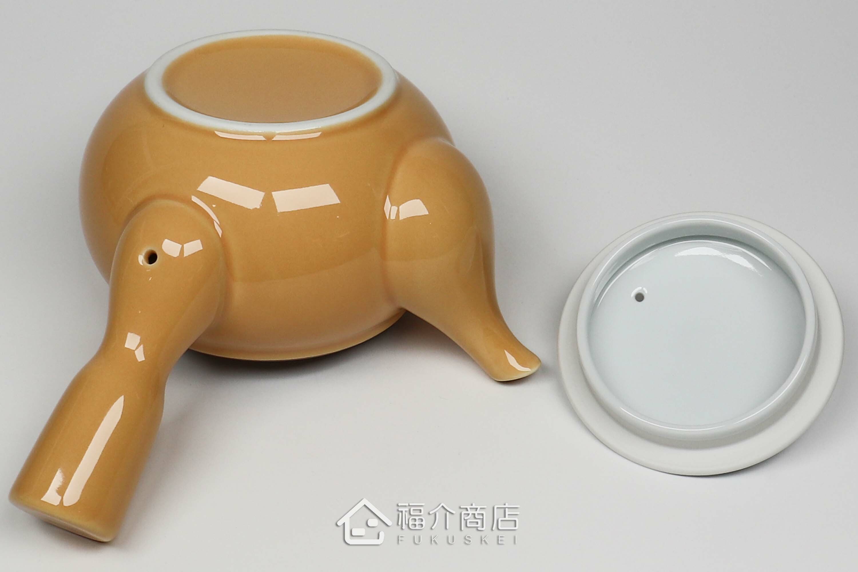 泡茶用的黃色陶茶壺