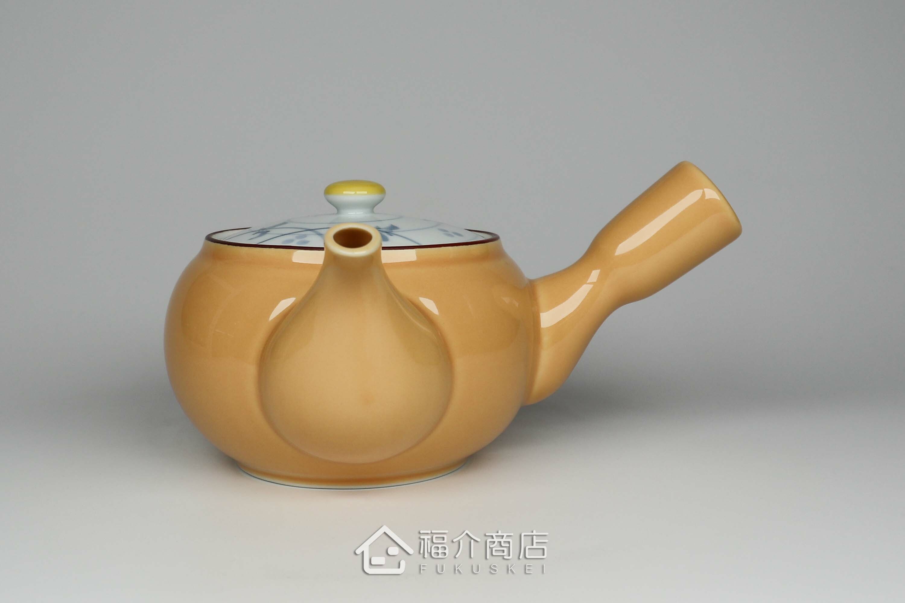 泡茶用的黃色陶茶壺