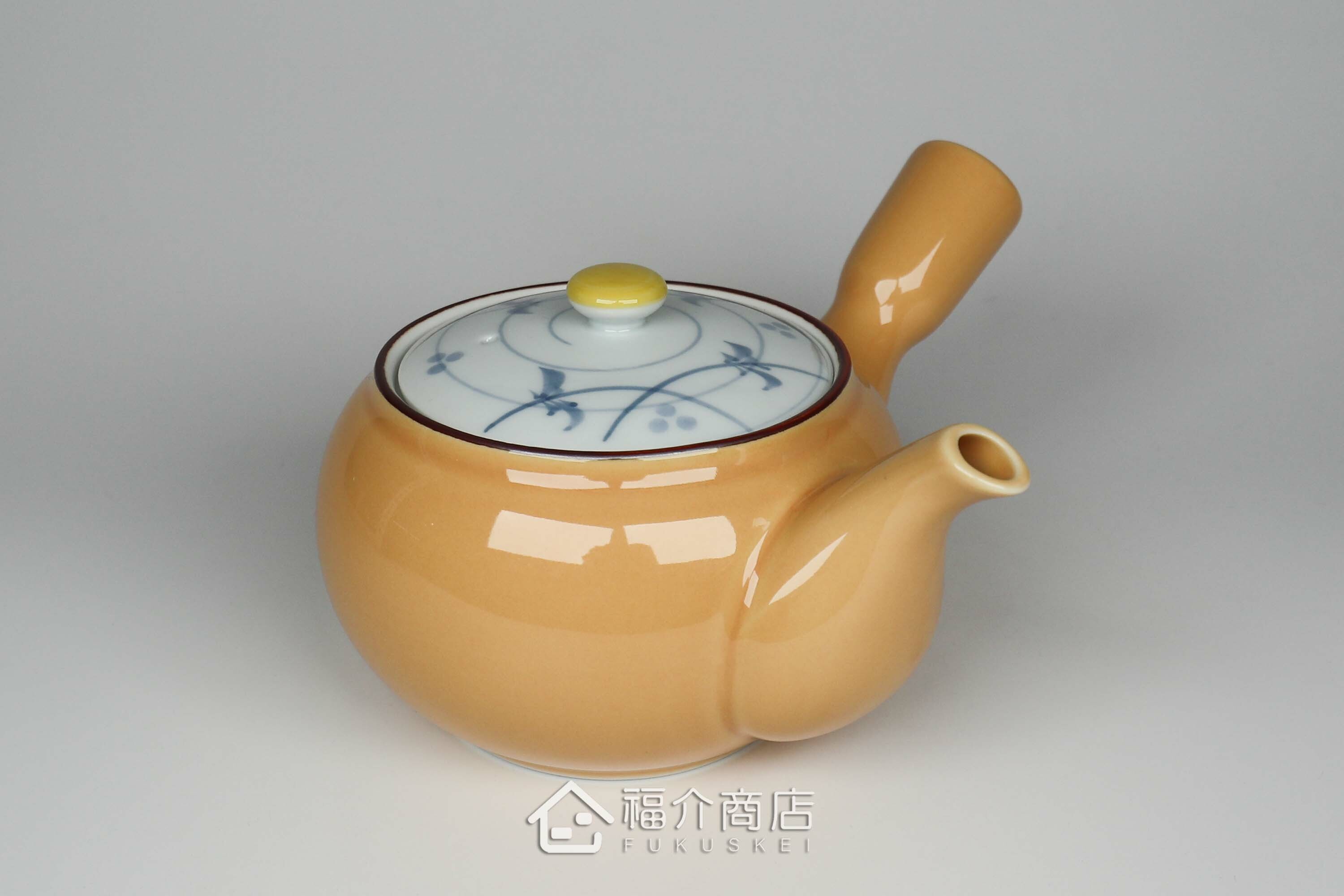 泡茶用的黃色陶茶壺