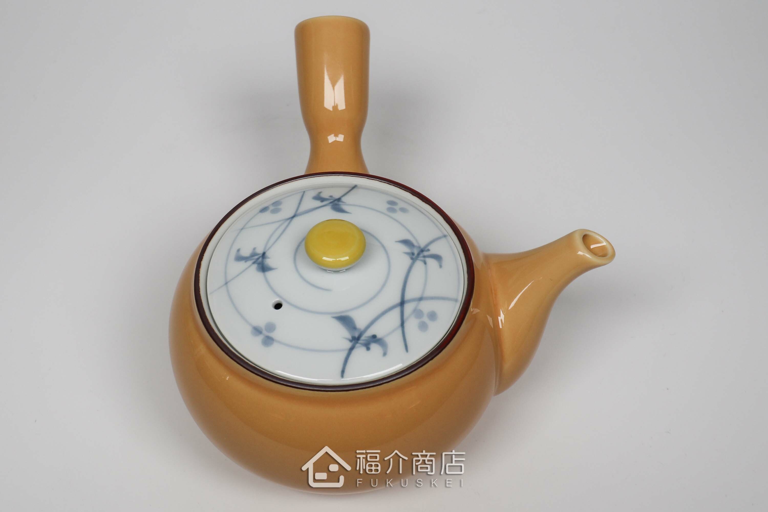 泡茶用的黃色陶茶壺