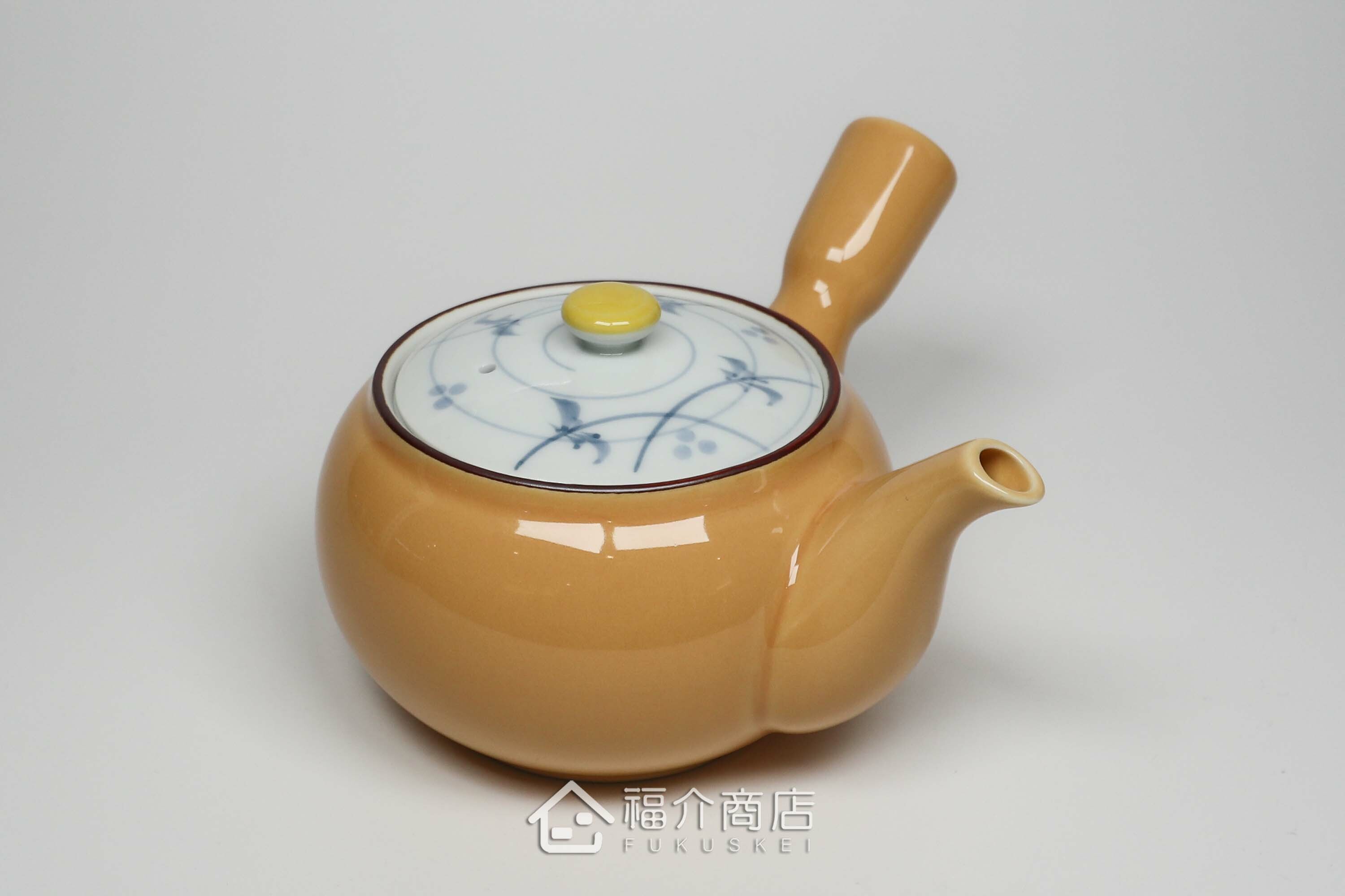 泡茶用的黃色陶茶壺