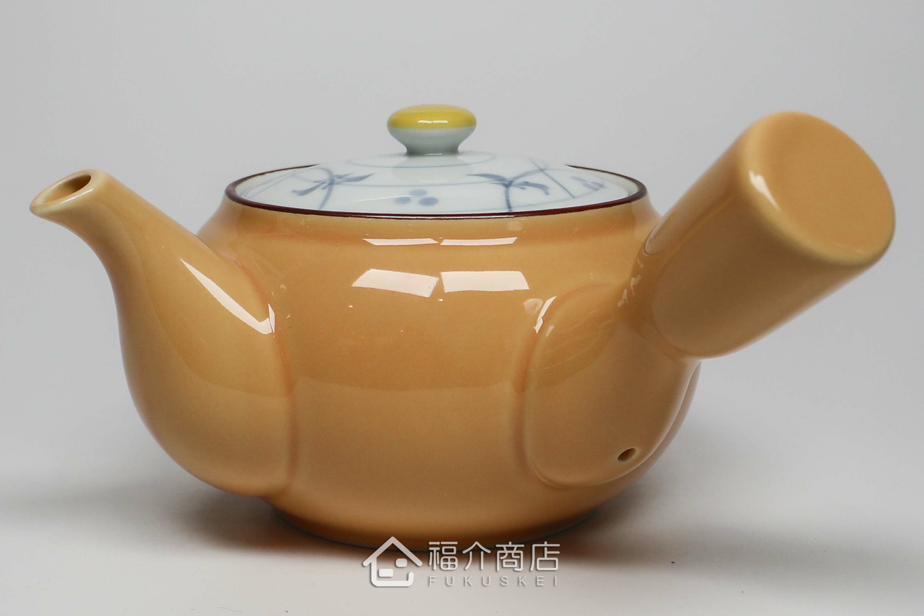 泡茶用的黃色陶茶壺