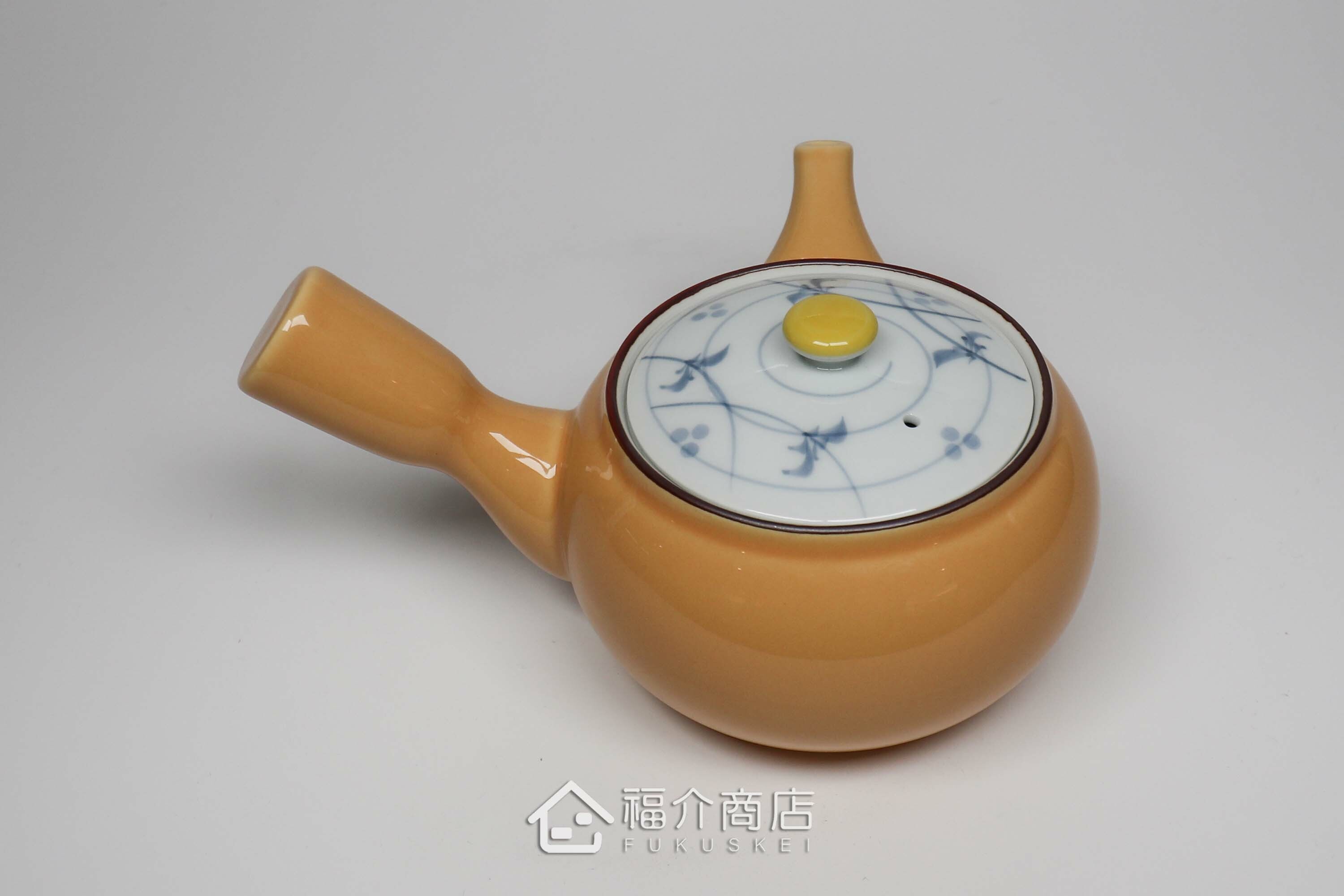 泡茶用的黃色陶茶壺