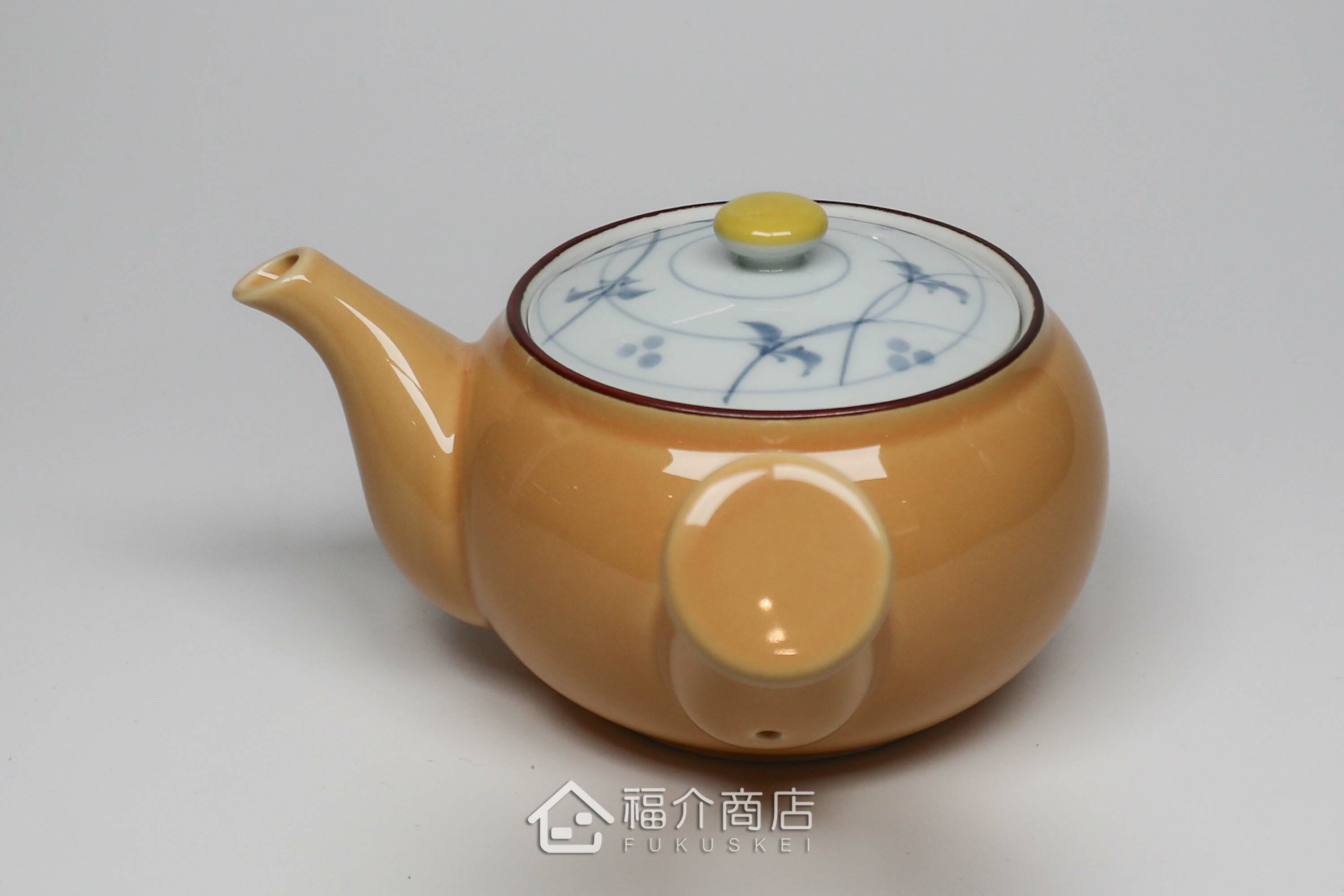 泡茶用的黃色陶茶壺