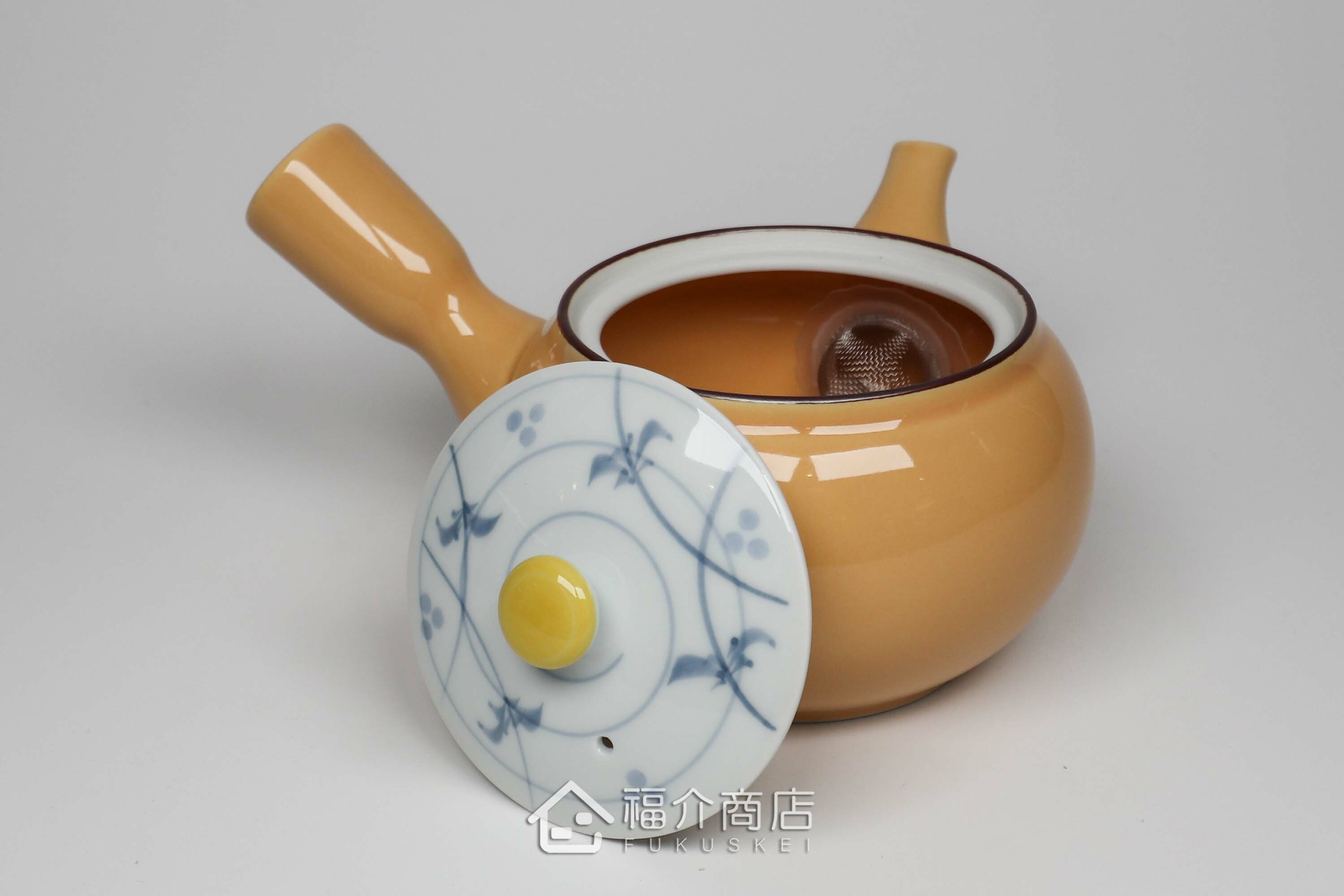 泡茶用的黃色陶茶壺