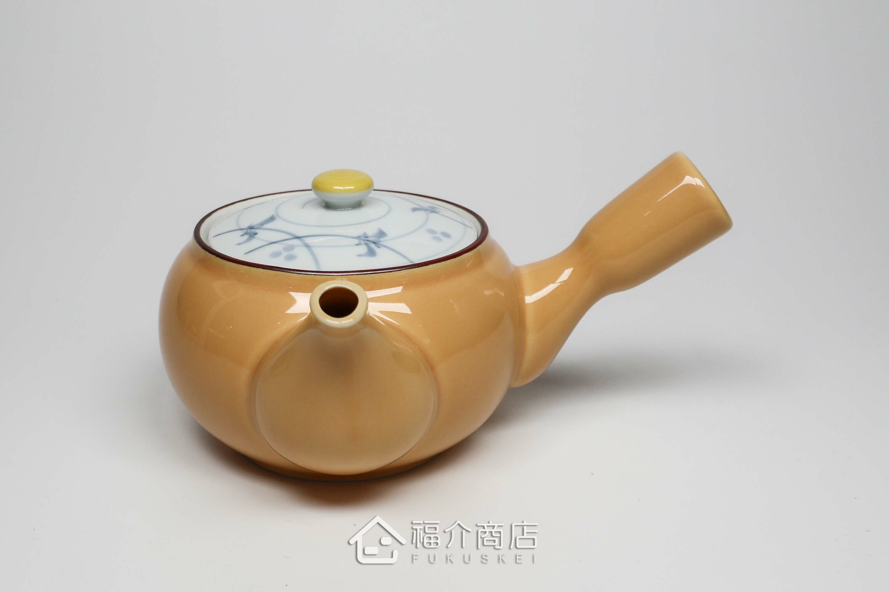泡茶用的黃色陶茶壺