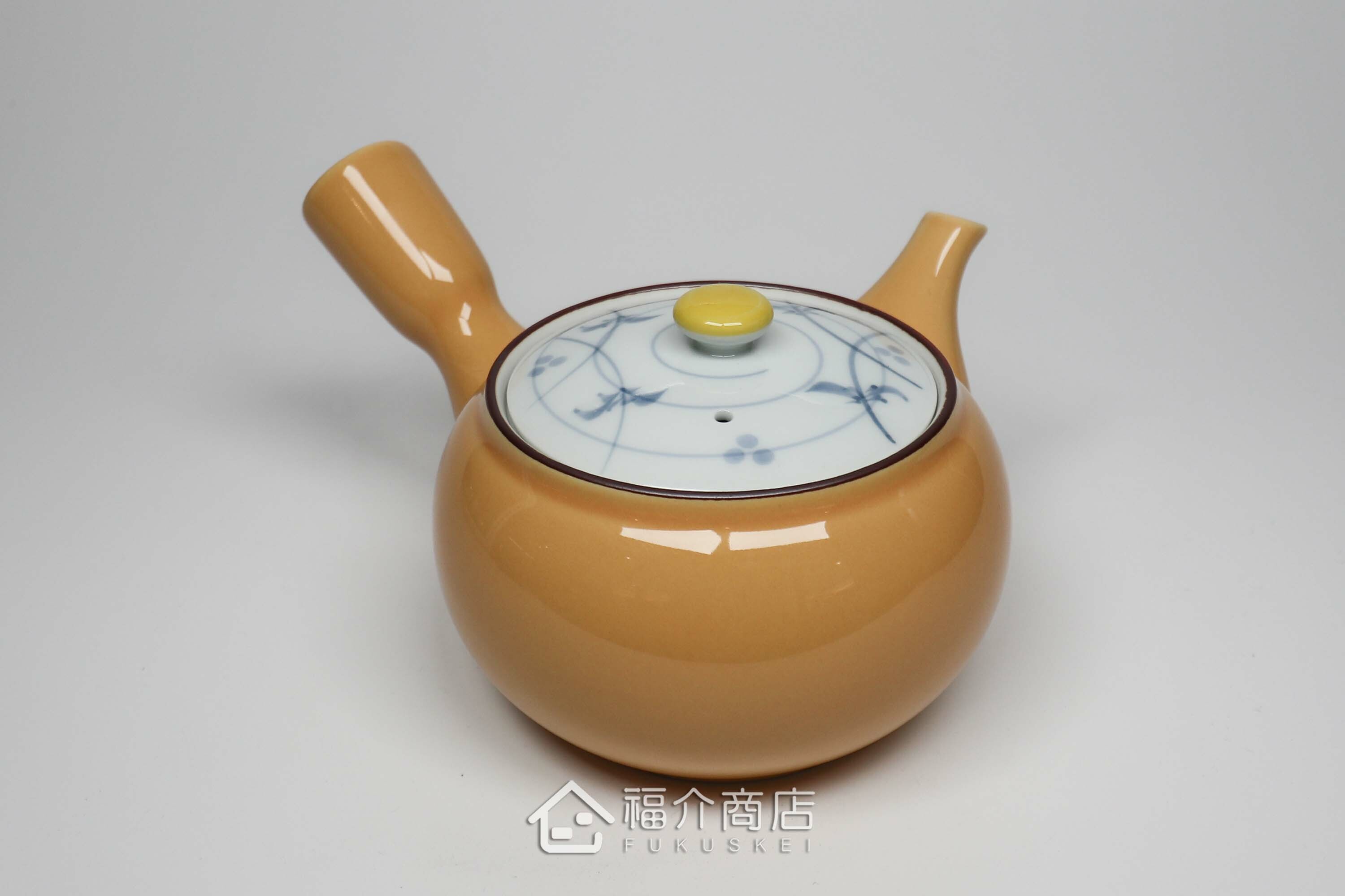 泡茶用的黃色陶茶壺