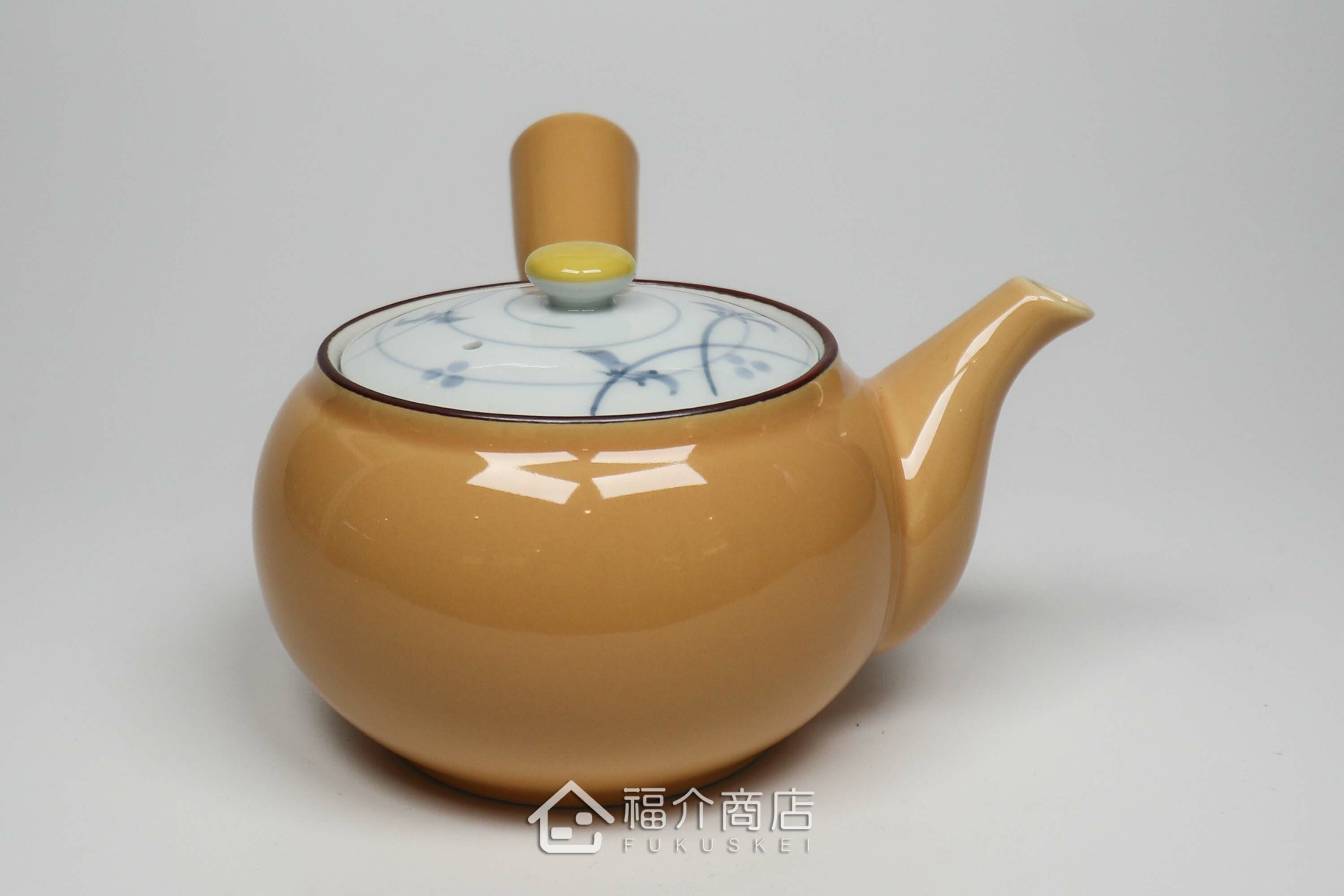 泡茶用的黃色陶茶壺