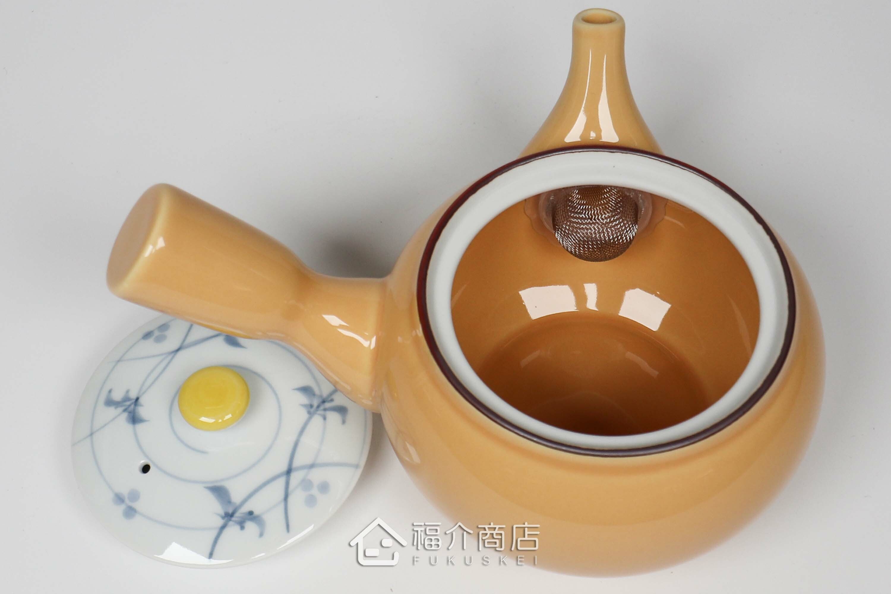 泡茶用的黃色陶茶壺