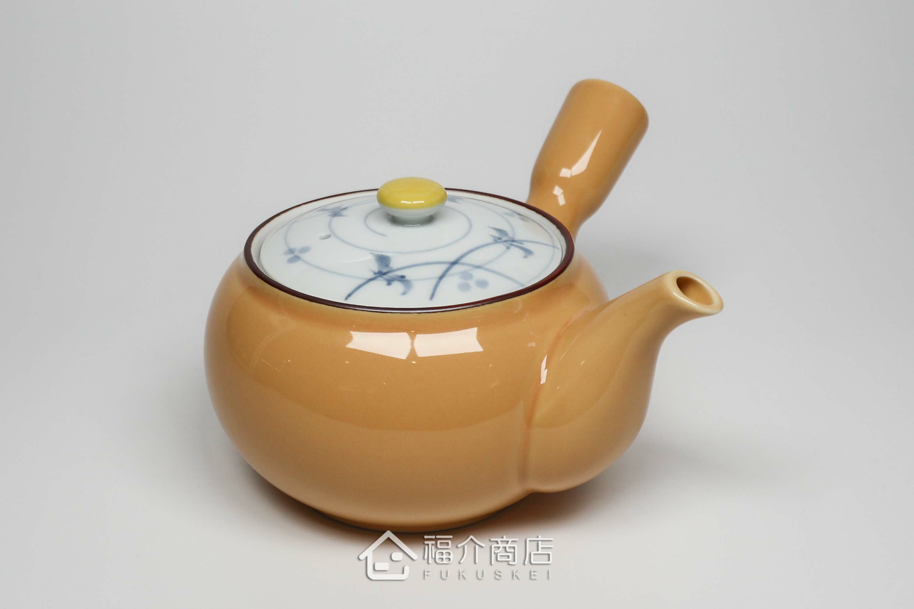 泡茶用的黃色陶茶壺