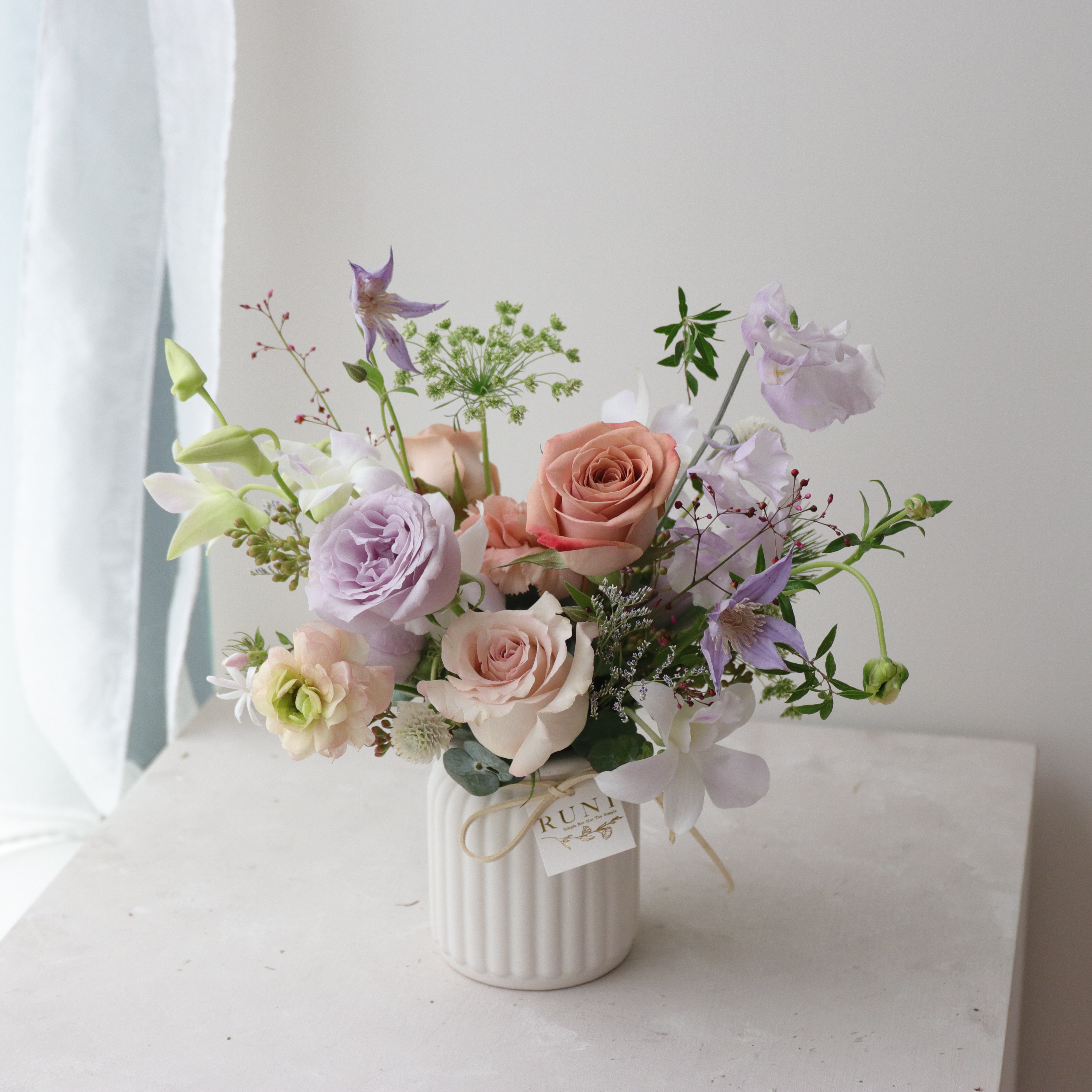 氣質粉紫色系牛奶瓶桌花