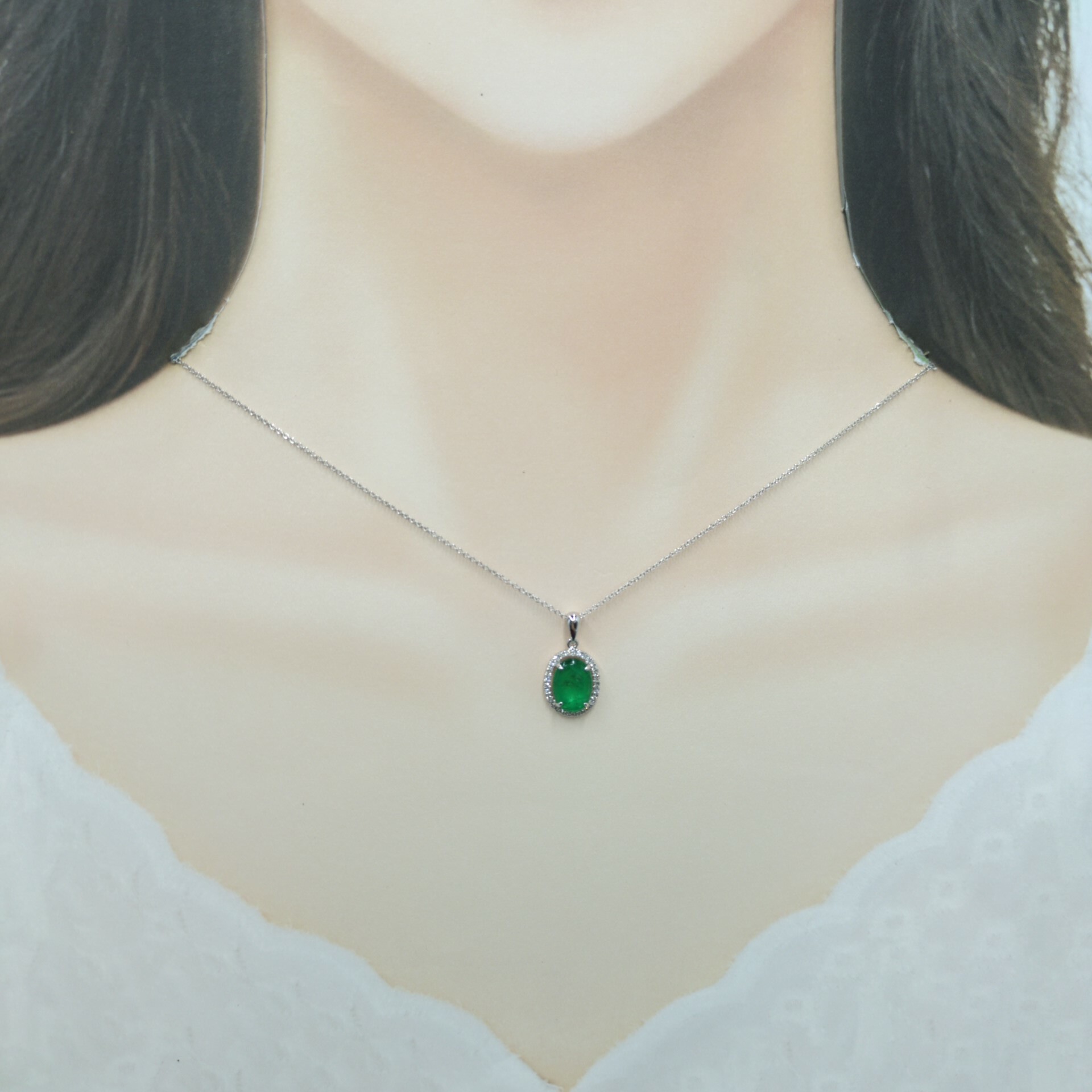 18K White Gold 0.84ct Emerald and Diamond Pendent