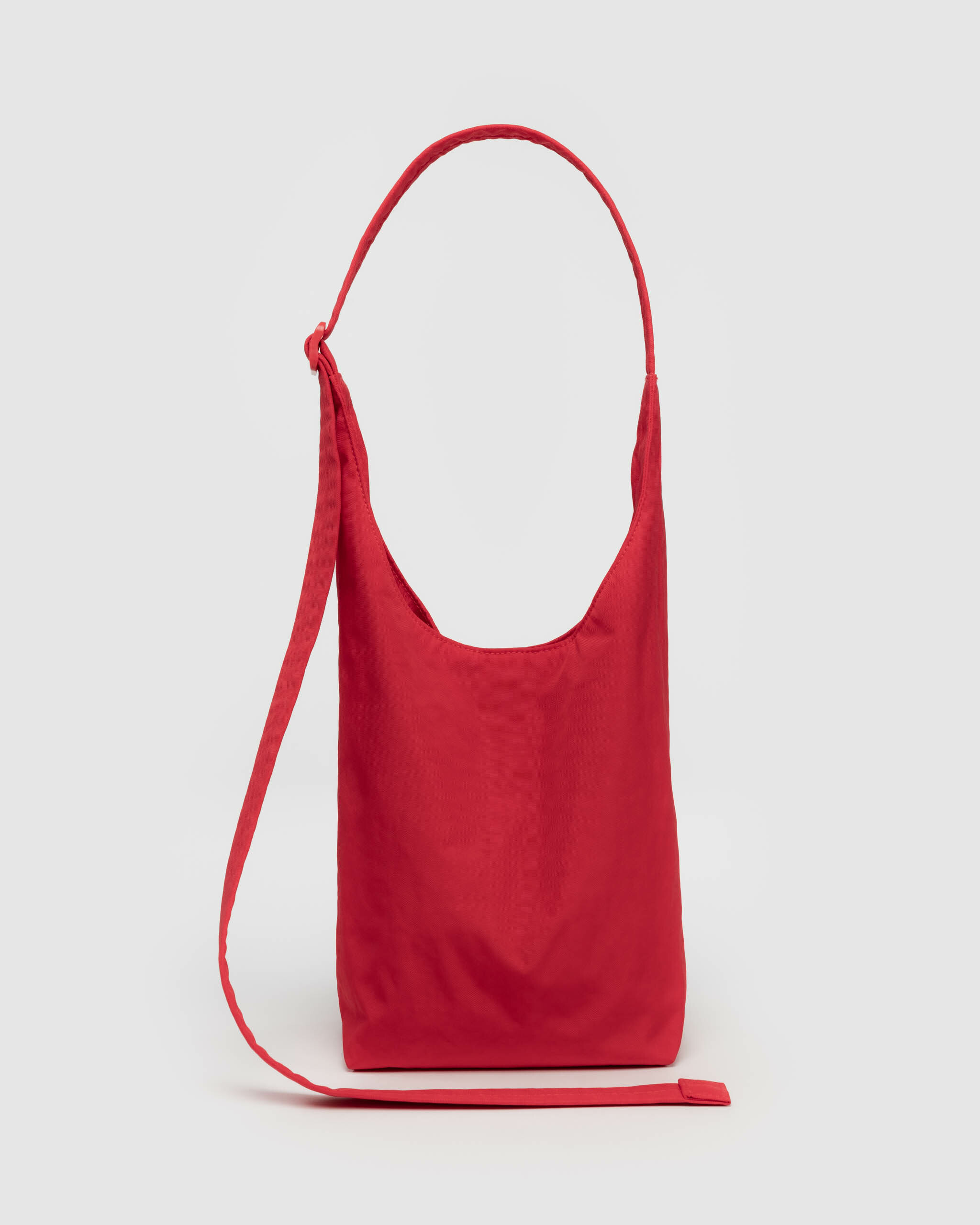 SMALL NYLON SLING - Candy Apple | BAGGU