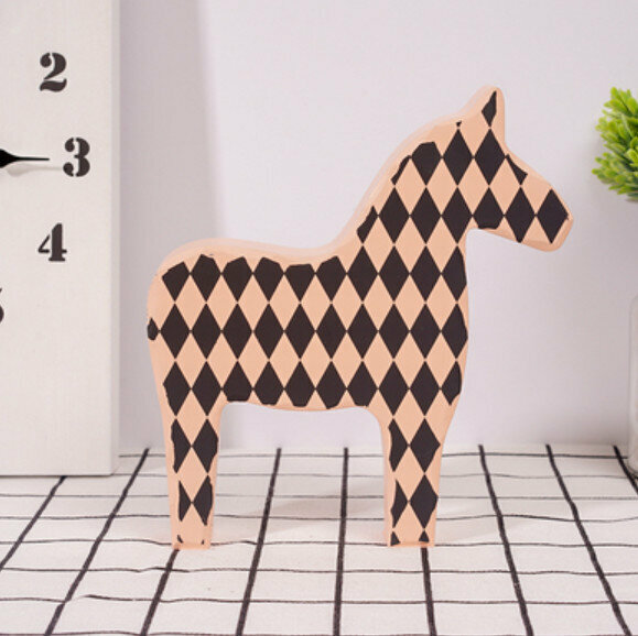 New decorative furnishings [large orange wooden horse]