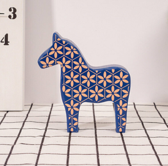 New decorative furnishings [small blue wooden horse]
