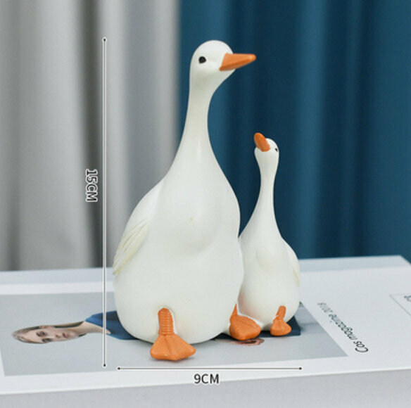 New decorative furnishings [pair of large white ducks]