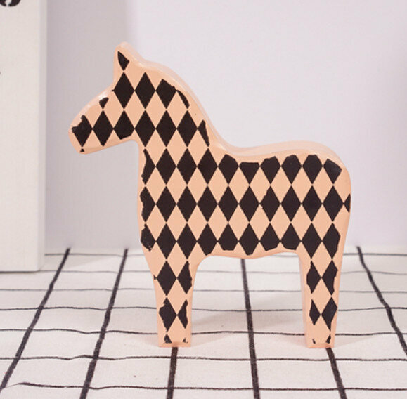 New decorative furnishings [small orange wooden horse]