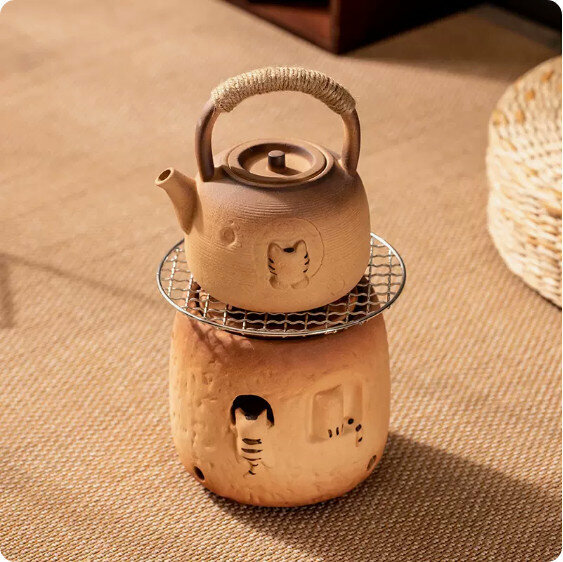 Hot-selling indoor charcoal fire and tea-making stove set [coarse pottery "Kitten" teapot with beam + round mouth warm cat charcoal stove + grilling net]