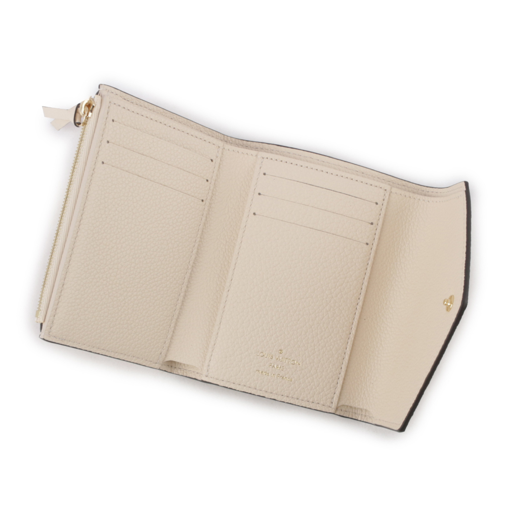 【Louis Vuitton / LV】Monogram VICTORINE牛皮壓印零錢袋短夾(奶油色) M82344