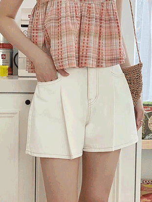 前打折白色短裙褲