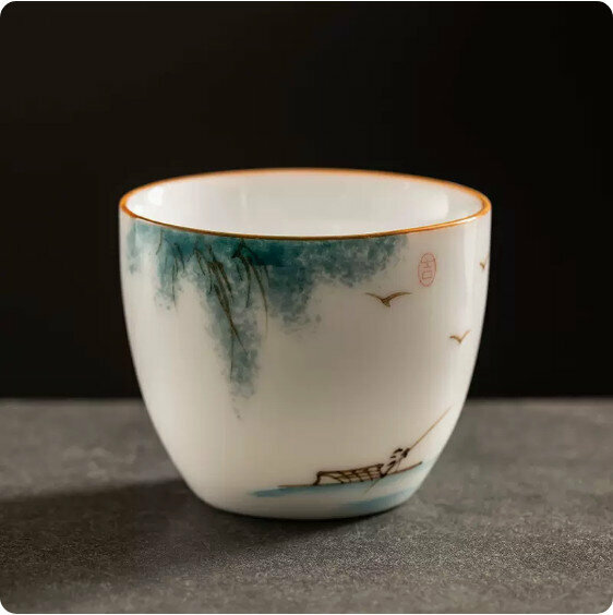 Hotly recommended mutton-fat jade hand-painted ceramic tea cup [fishing]