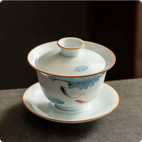 Hotly recommended mutton-fat jade white porcelain hand-painted three-cai bowl [playing fish]