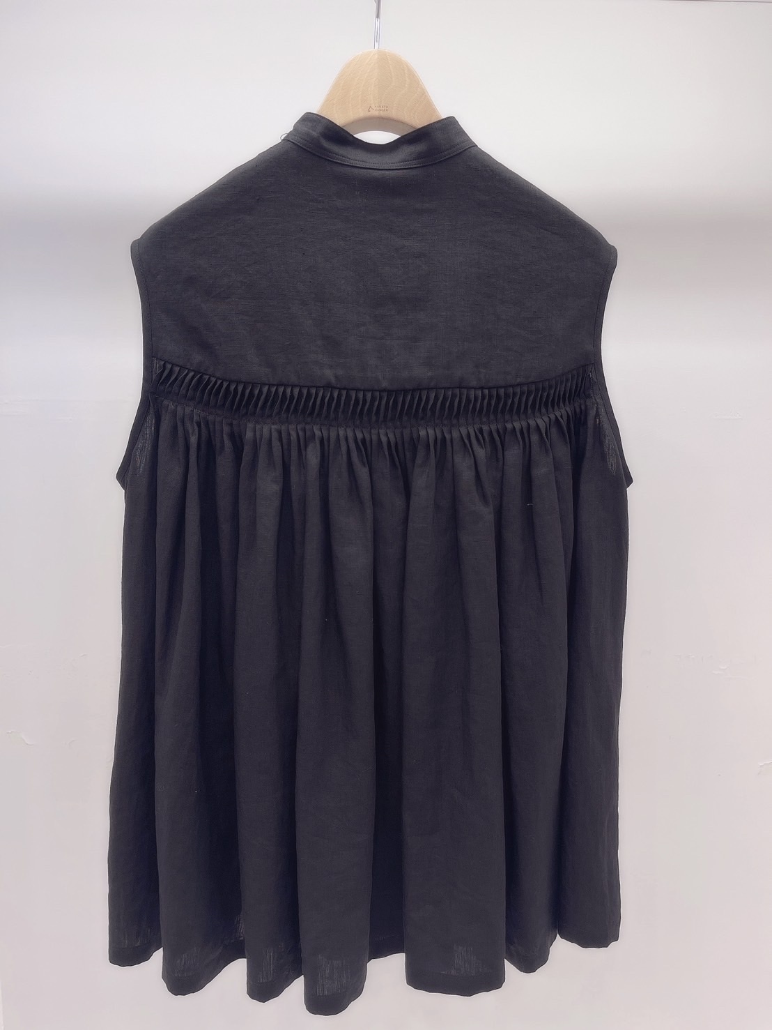 設計師圓肩摺版上衣