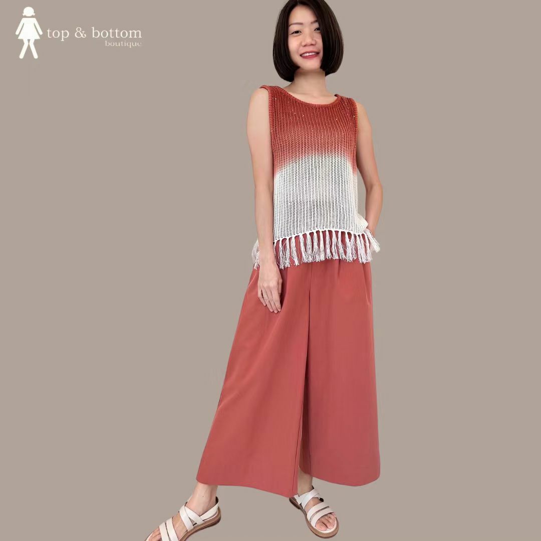 STRAP KNIT BLOUSE WITH TASSEL HEM