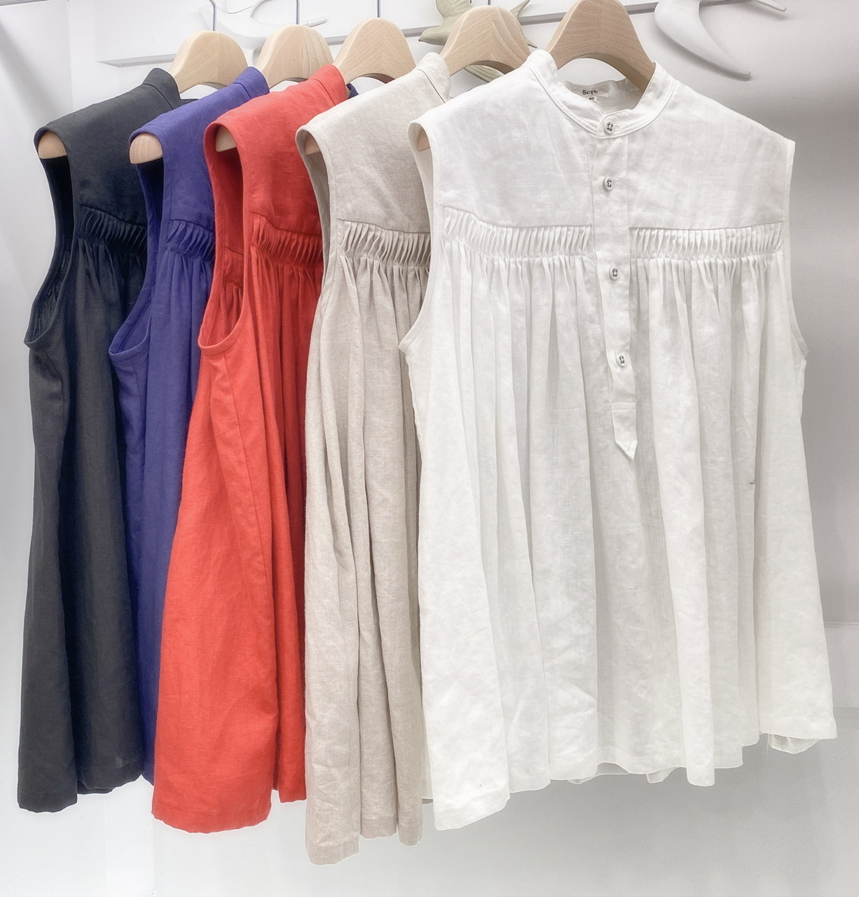 設計師圓肩摺版上衣