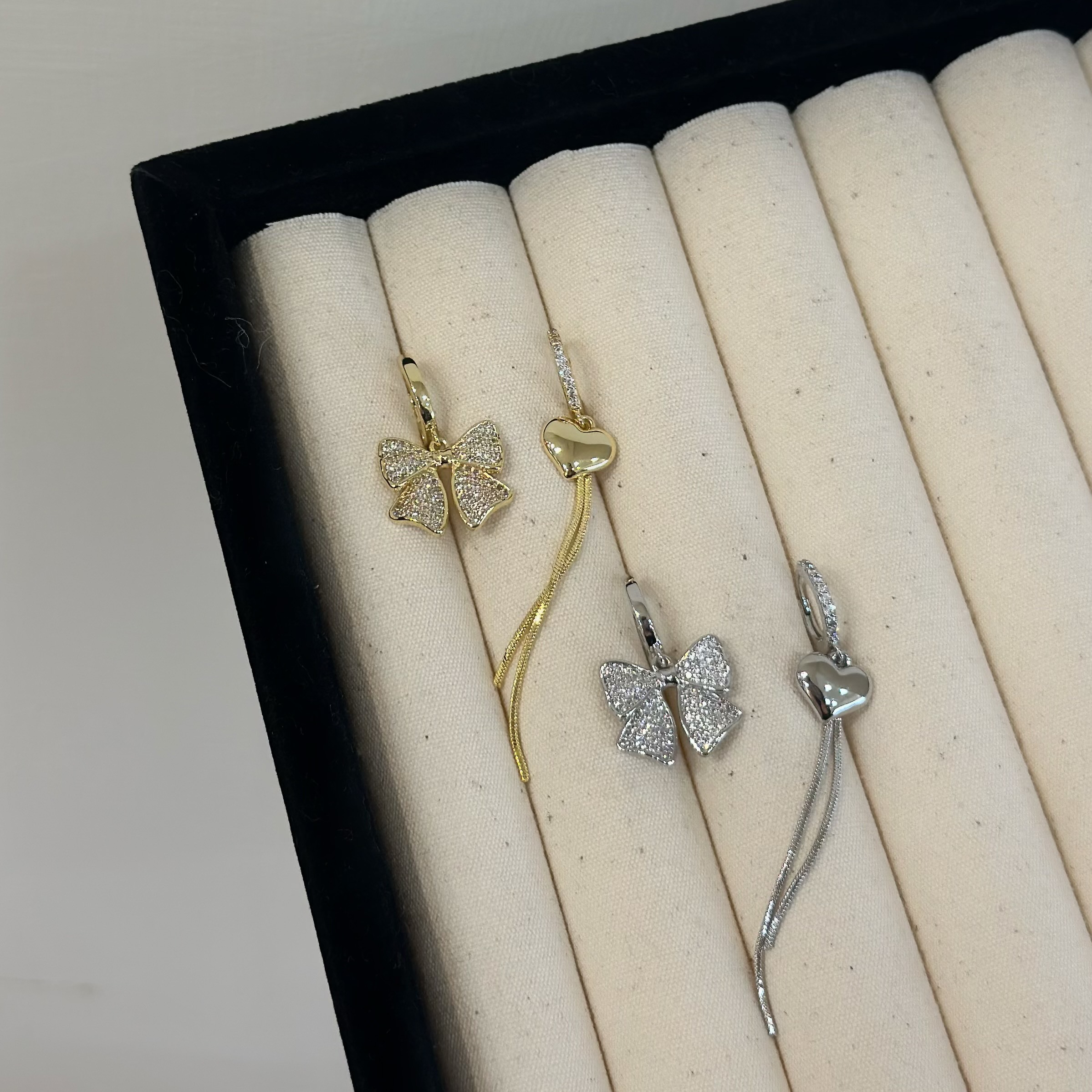 H21滿鑽蝴蝶結愛心不對稱垂吊