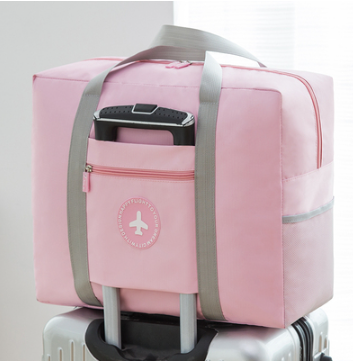 Hotly recommended luggage and maternity bag storage bag (light pink) (double thickened - large size 55*24*45CM)