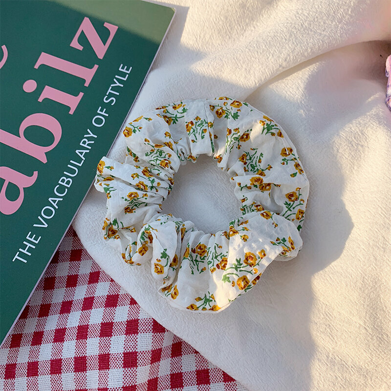 Hot trendy hair ties and hair accessories (the little yellow flower in the story)