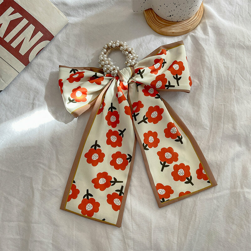 Popular fashion bow hair tie hair accessory (orange flower-hair rope)