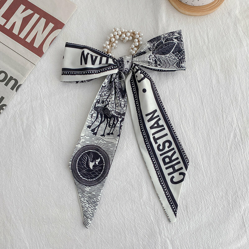 Popular fashion bow hair tie hair accessories (flamingo+letter-hair rope)