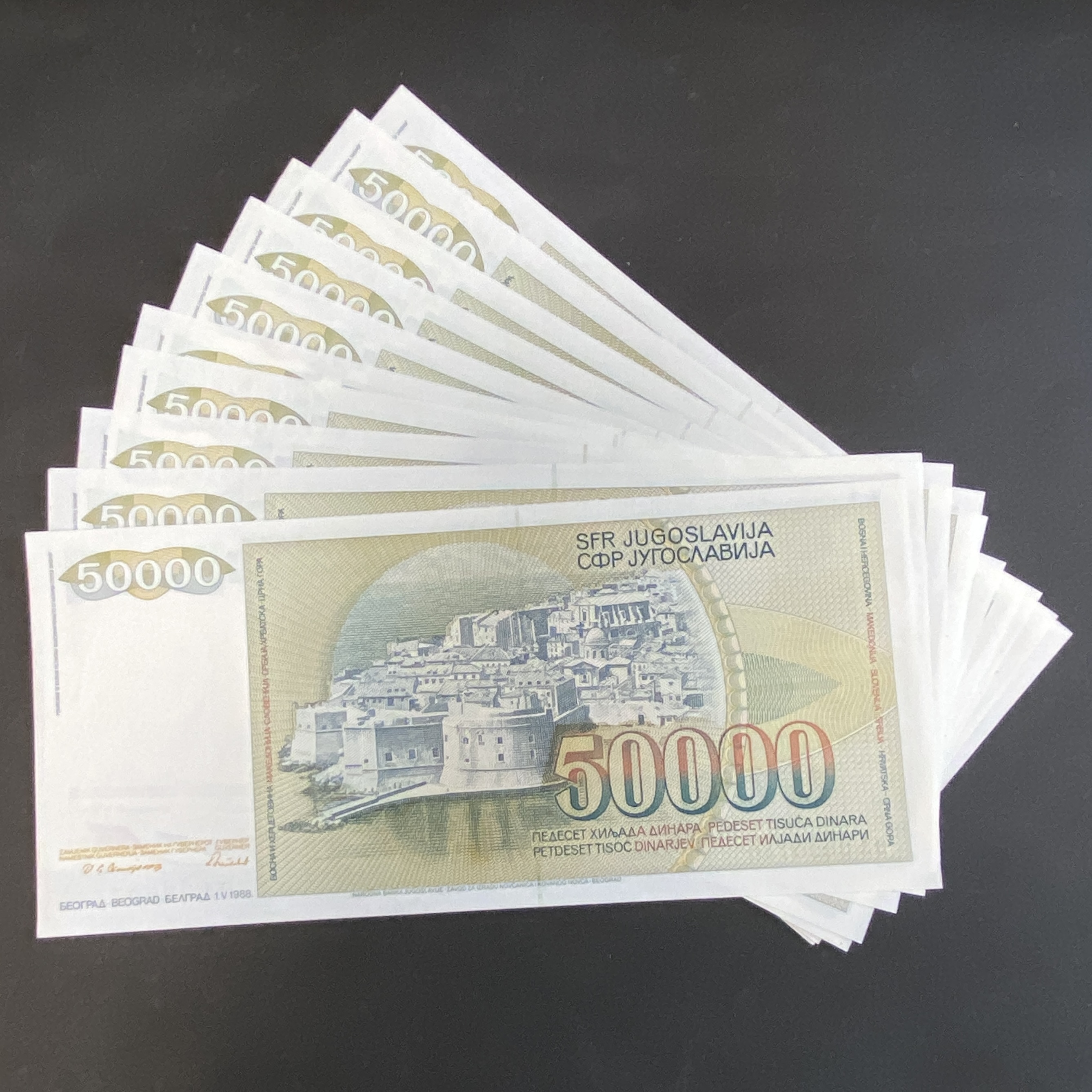 1988 Yugoslav 50000 Dinars 10 banknotes (AU, slight yellowing on straight edges) with some in sequence.