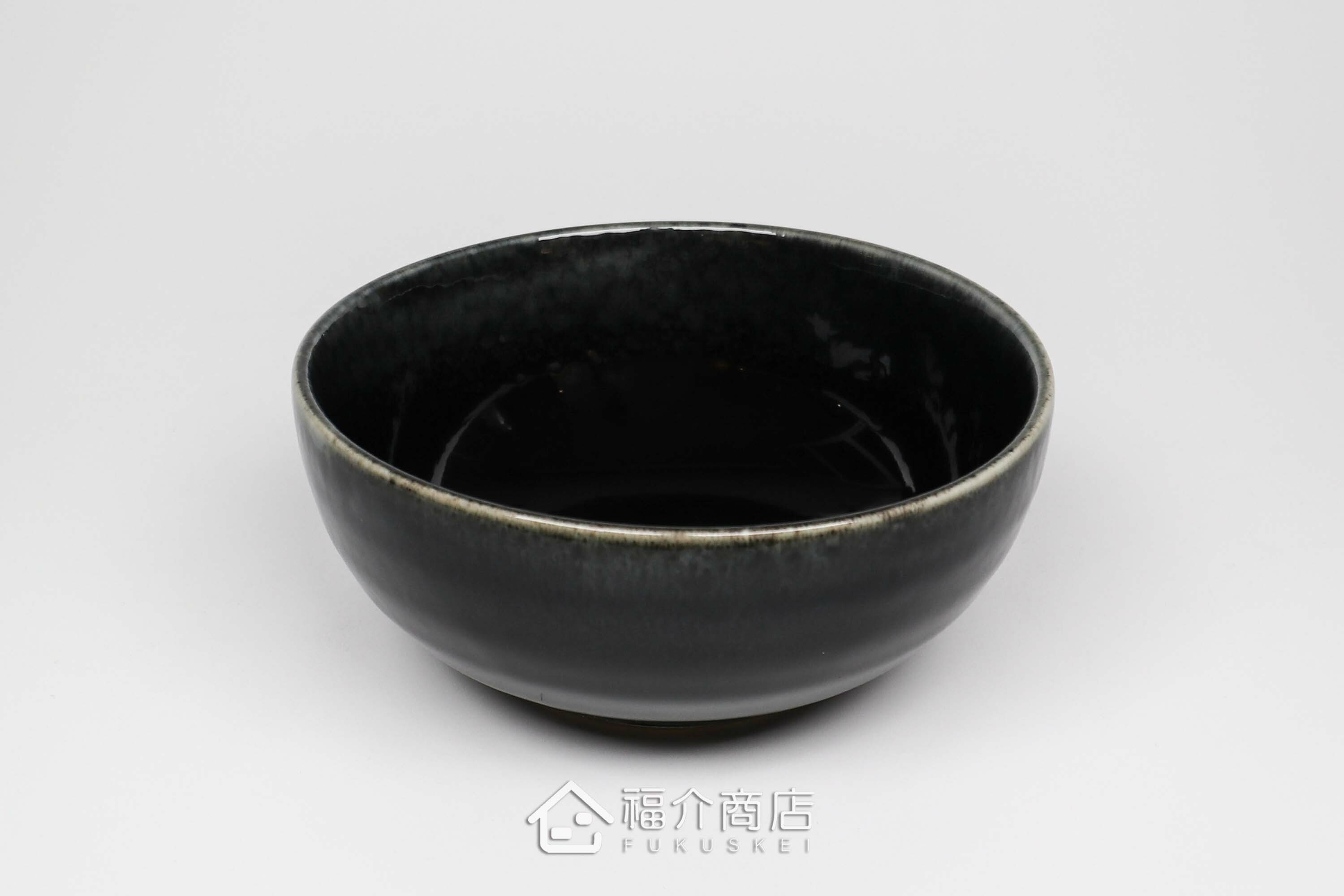 盛裝食物的黑藍色陶碗小缽