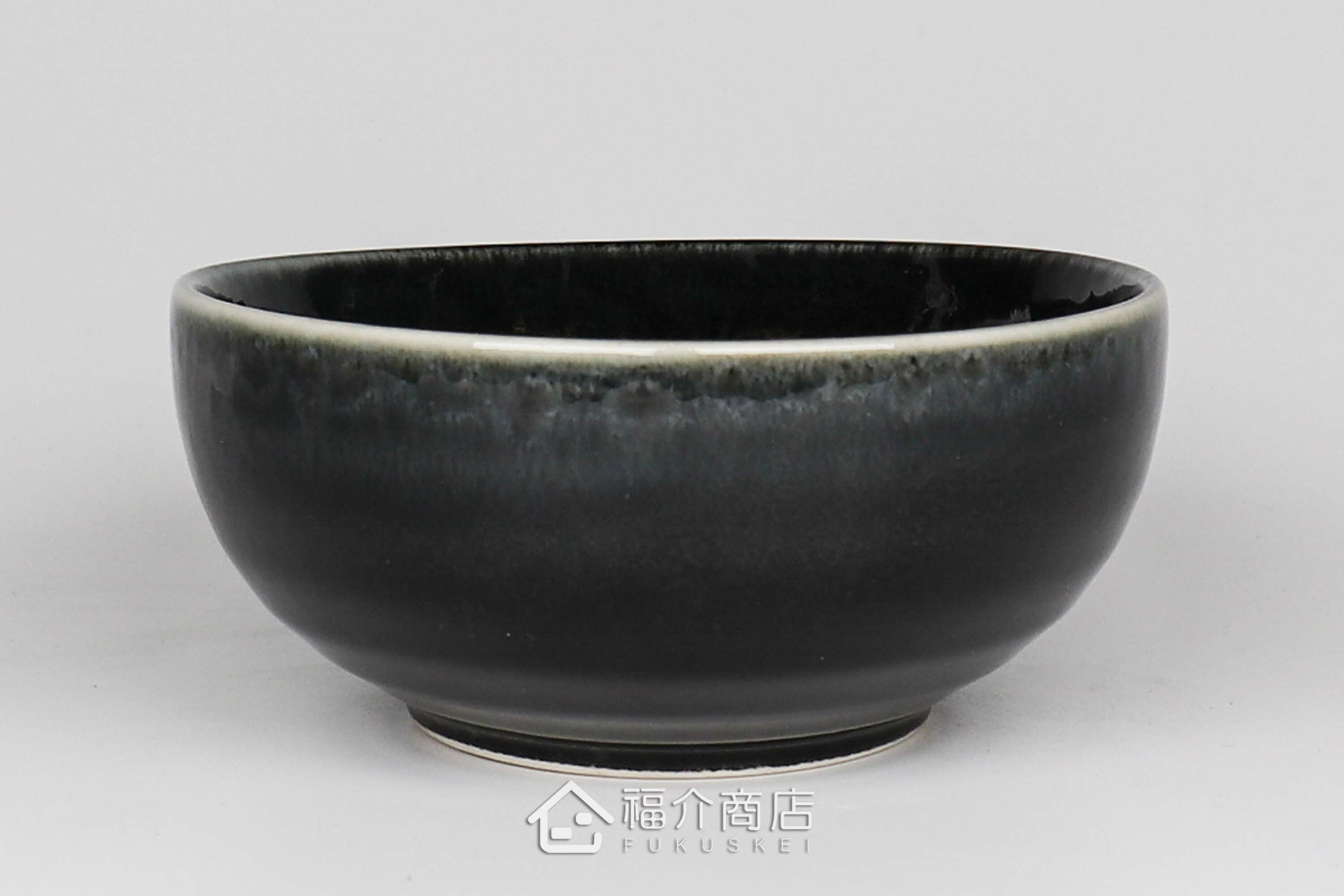 盛裝食物的黑藍色陶碗小缽