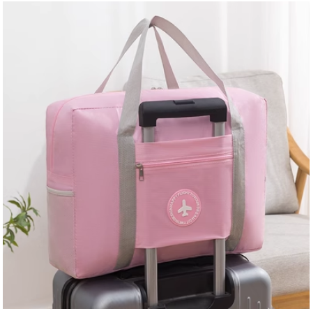 Popular portable travel storage bag that can be used in trolley suitcases (pink) (large size: 55*24*45cm [double-layer thickened])