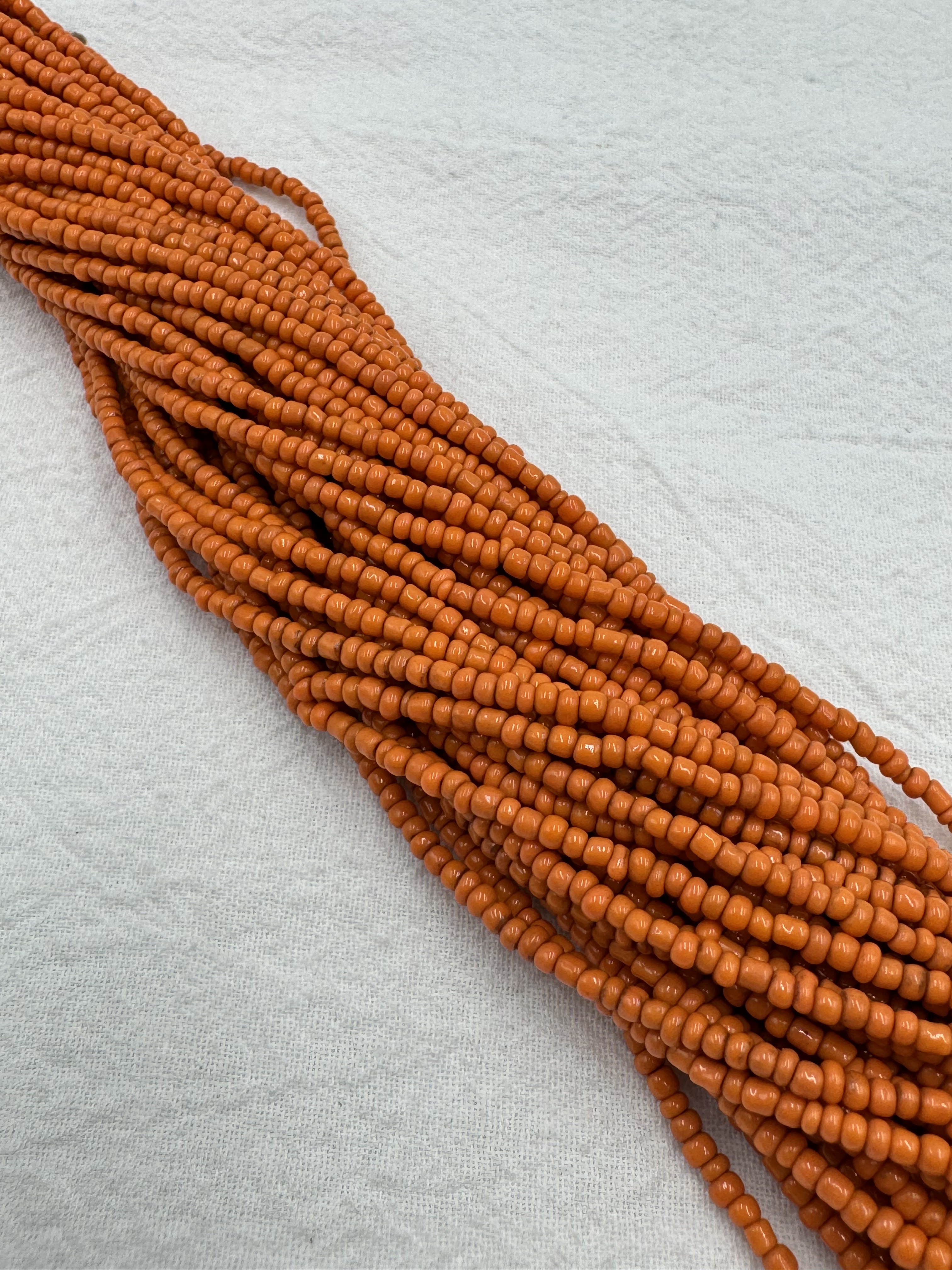 串-尼泊爾橘色老繡珠寬2mm總長48cm共24條