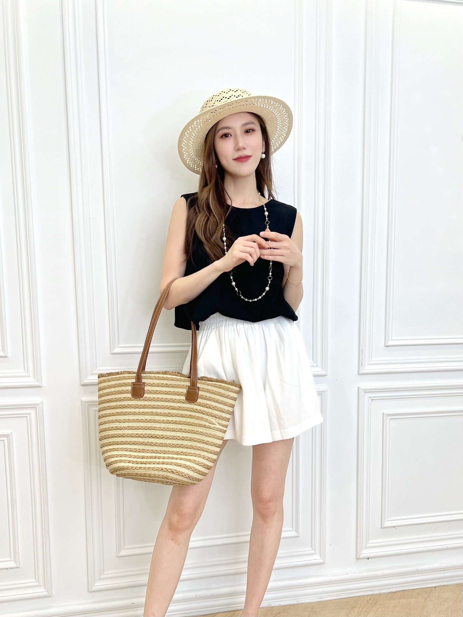 後扭結透涼長背心