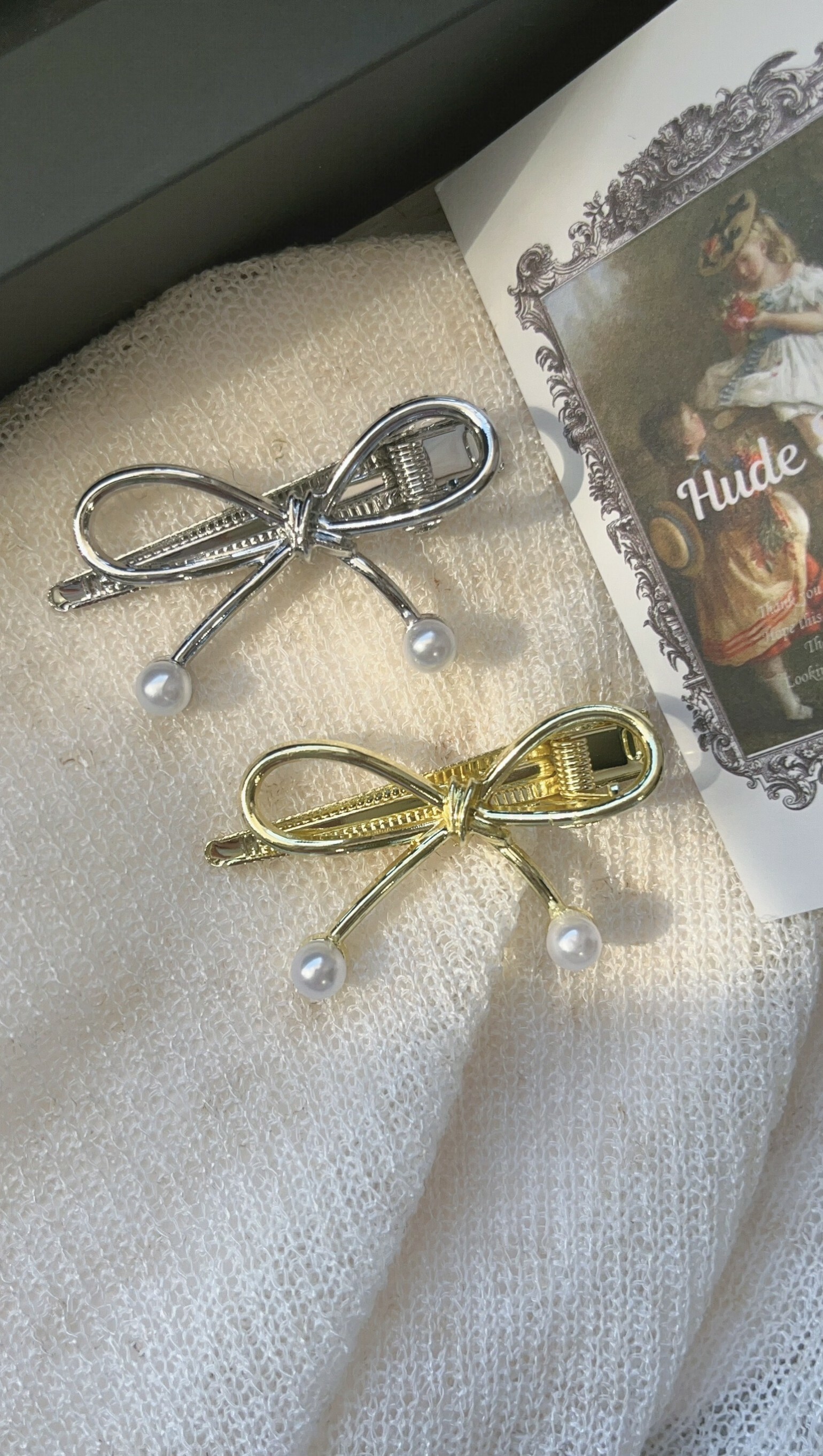 手綁感蝴蝶結尾端小珍珠髮夾