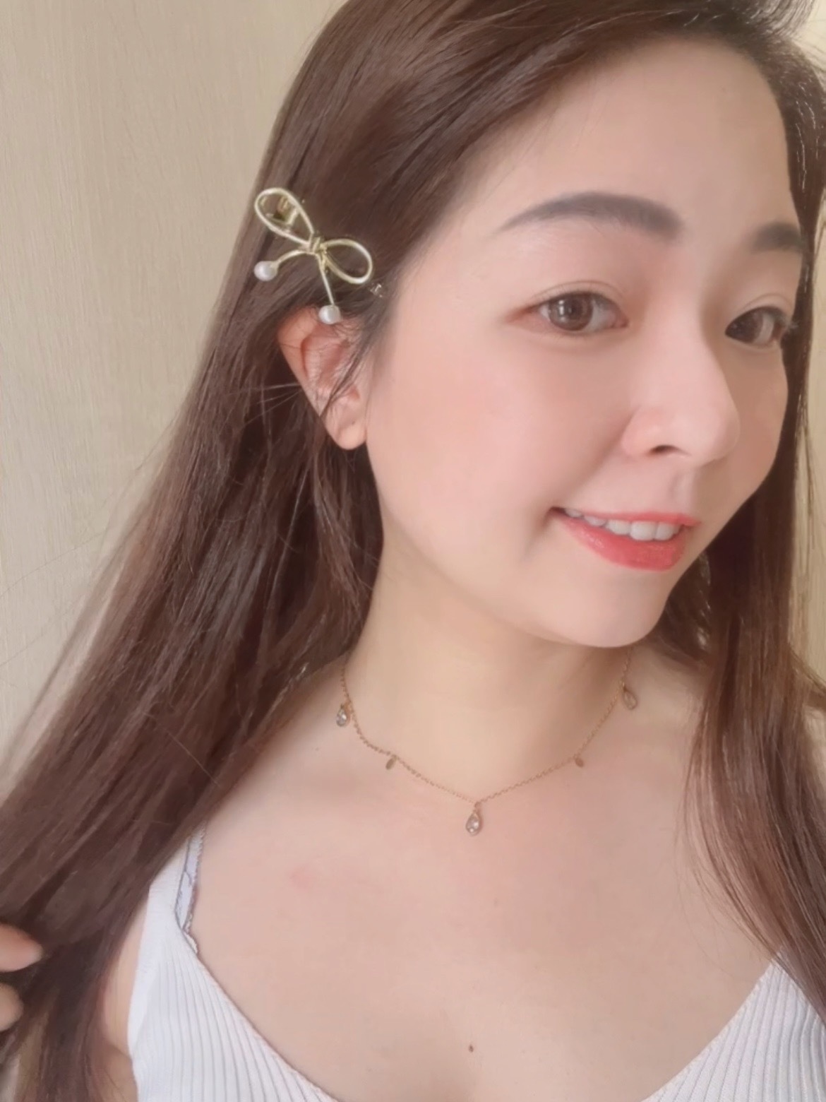 手綁感蝴蝶結尾端小珍珠髮夾