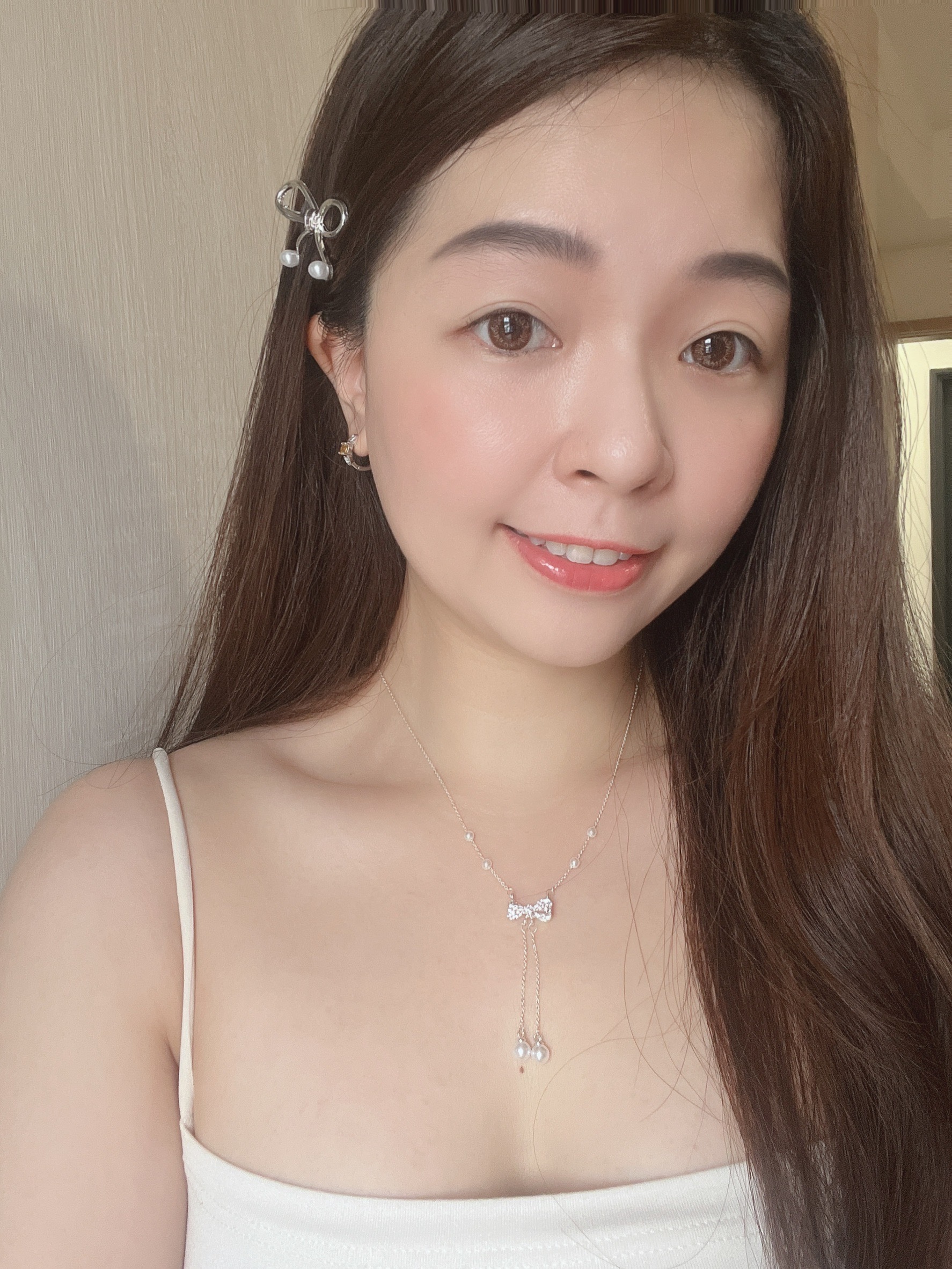 手綁感蝴蝶結尾端小珍珠髮夾